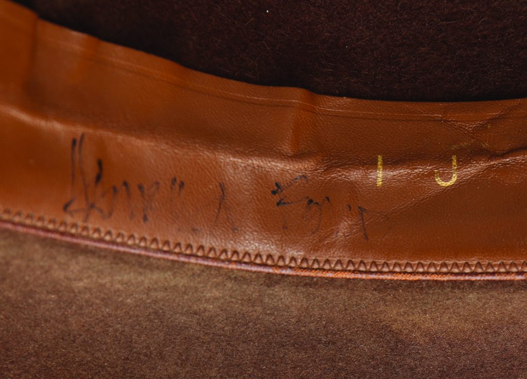 At some point after Raiders of the Lost Ark was filmed, a collector asked Harrison Ford to sign the Indiana Jones hat. He obliged, applying his signature in the hat liner band.