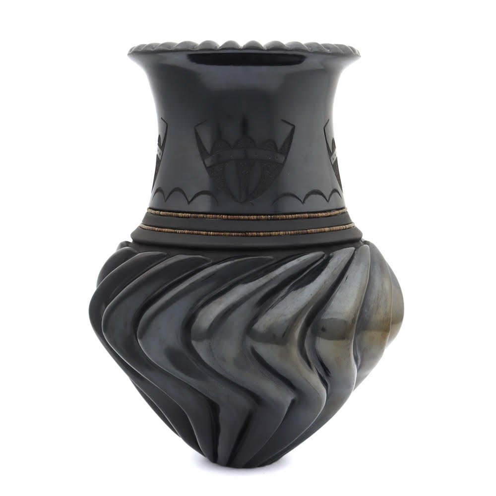 A black on black water jug-shape vase by Nancy Youngblood and Russell Sanchez could command $25,000.